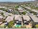 Picturesque neighborhood featuring manicured lawns, tree-lined streets, and community pools, close to shopping, dining, and entertainment at 10506 Arnica Way, Las Vegas, NV 89135