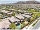 Tranquil neighborhood featuring well-maintained homes, lush landscaping, and serene streets, set against a backdrop of majestic mountains at 10506 Arnica Way, Las Vegas, NV 89135
