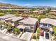Attractive home with a well-manicured lawn, mature trees, and a welcoming front porch, creating a charming curb appeal in this community at 10506 Arnica Way, Las Vegas, NV 89135