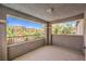 Outdoor balcony with views of palm trees and the surrounding landscape at 10506 Arnica Way, Las Vegas, NV 89135