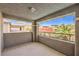 Outdoor balcony with views of neighboring houses and desert foliage at 10506 Arnica Way, Las Vegas, NV 89135