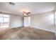 Bright living area with ample space, neutral walls, and cozy ceiling fan at 10506 Arnica Way, Las Vegas, NV 89135