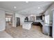 Spacious kitchen featuring granite countertops, stainless steel appliances, and a center island at 10598 Aphrodite St, Las Vegas, NV 89183