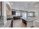 Gourmet kitchen featuring a large island, pendant lighting, and stainless steel appliances at 10598 Aphrodite St, Las Vegas, NV 89183