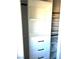 Walk in closet is equipped with custom shelves, drawers and rods for optimal storage at 10908 Royal Highlands St, Las Vegas, NV 89141