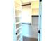 Empty closet with custom shelving, ideal for organized storage at 10908 Royal Highlands St, Las Vegas, NV 89141