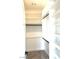 Walk-in closet with custom storage solutions including shelves and hanging rods at 10908 Royal Highlands St, Las Vegas, NV 89141