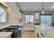 Bright kitchen with stainless steel appliances, and countertops at 10908 Royal Highlands St, Las Vegas, NV 89141
