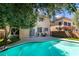 Inviting backyard pool and patio area with room for outdoor seating at 10908 Royal Highlands St, Las Vegas, NV 89141