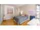 Cozy bedroom showcasing a comfy bed, window with natural light, and stylish décor at 11764 Golden Moments Ave, Las Vegas, NV 89138