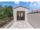 Charming outdoor balcony showcasing tile floors, a metal railing, and a dining area at 11775 Woodbrook Ct, Las Vegas, NV 89141