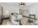 Airy primary bedroom features a ceiling fan, plush carpet, and stylish decor at 11775 Woodbrook Ct, Las Vegas, NV 89141