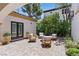 Inviting courtyard with paved patio and comfortable seating arrangement at 11775 Woodbrook Ct, Las Vegas, NV 89141