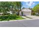 Charming single-story home with manicured lawn and inviting curb appeal at 11775 Woodbrook Ct, Las Vegas, NV 89141