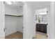 Hallway leading to a bathroom with modern fixtures and walk-in closet at 11775 Woodbrook Ct, Las Vegas, NV 89141