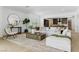Open concept living space showcasing modern decor, natural light, and seamless flow to the kitchen at 11775 Woodbrook Ct, Las Vegas, NV 89141