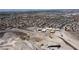 New construction in a planned community with city views featuring homes under construction with heavy equipment visible in the desert landscape at 1204 Powerwall Pl, Henderson, NV 89012