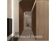 Contemporary hallway with architectural design elements, clean lines, and warm wood tones at 1204 Powerwall Pl, Henderson, NV 89012