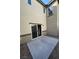 Concrete backyard patio with sliding glass door at 12170 Midnight Pine Rd # 3, Las Vegas, NV 89183
