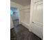 Bathroom with a white bathtub and gray vinyl flooring at 12170 Midnight Pine Rd # 3, Las Vegas, NV 89183