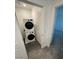 Convenient laundry room featuring stacked washer and dryer at 12170 Midnight Pine Rd # 3, Las Vegas, NV 89183