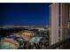 Expansive nighttime city view, showcasing surrounding entertainment and resort venues with bright lights at night at 135 E Harmon Ave # 2420, Las Vegas, NV 89109