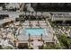 Aerial view of pool with lounge chairs and manicured landscaping at 135 E Harmon Ave # 2420, Las Vegas, NV 89109