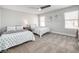 Bright bedroom with two beds, plush carpeting, and large windows at 1512 Bellglen Dr, Las Vegas, NV 89128