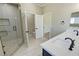 Elegant bathroom with double sinks, glass shower, and sleek black accents at 1580 S Tiptop Trl, Pahrump, NV 89048