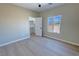 Well-lit bedroom featuring neutral walls and a window with mountain views at 1580 S Tiptop Trl, Pahrump, NV 89048
