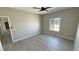 Neutral bedroom featuring ceiling fan, recessed lights, and window view at 1580 S Tiptop Trl, Pahrump, NV 89048