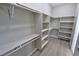 Spacious walk-in closet with custom shelving and ample storage space at 1580 S Tiptop Trl, Pahrump, NV 89048