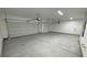 Two-car garage with two door bays, overhead lighting and plenty of room at 1580 S Tiptop Trl, Pahrump, NV 89048