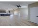 Open-concept living area boasts sleek floors, recessed lighting and an airy feel at 1580 S Tiptop Trl, Pahrump, NV 89048