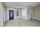 Bright living room showcasing a stylish front door, recessed lighting and neutral paint at 1580 S Tiptop Trl, Pahrump, NV 89048