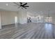 Open concept living room featuring ceiling fan, recessed lighting and a view of the kitchen at 1580 S Tiptop Trl, Pahrump, NV 89048