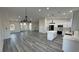 Open-concept living space seamlessly connects the living room and kitchen, perfect for entertaining at 1580 S Tiptop Trl, Pahrump, NV 89048