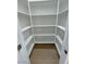 Bright, walk-in pantry with abundant shelving for all your storage needs at 1580 S Tiptop Trl, Pahrump, NV 89048