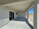 Covered patio with sliding glass doors, perfect for enjoying outdoor living and natural light at 1580 S Tiptop Trl, Pahrump, NV 89048