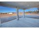Covered patio with an expansive view of the arid landscape and distant mountains at 1580 S Tiptop Trl, Pahrump, NV 89048