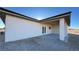 Covered patio area with access to the house through white-framed glass doors at 1580 S Tiptop Trl, Pahrump, NV 89048