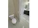 Neutral-toned toilet room adjacent to the main bath area at 1580 S Tiptop Trl, Pahrump, NV 89048