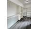 White walk-in closet with shelving and dark floors and recessed lighting for a bright feel at 1580 S Tiptop Trl, Pahrump, NV 89048