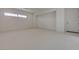 Clean bedroom design with neutral carpeting, white walls and a small horizontal window at 1600 Pleasant Bay Ct, Henderson, NV 89011
