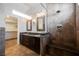 Ensuite bathroom features dual sinks and a spacious walk-in shower at 209 Camino Vista St, Henderson, NV 89012