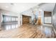 Bright foyer featuring high ceilings, wood floors, and rustic wood accent wall at 209 Camino Vista St, Henderson, NV 89012