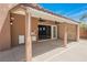 Covered outdoor patio featuring ceiling fans and an outdoor bar area at 209 Camino Vista St, Henderson, NV 89012