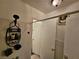 Compact bathroom with a shower caddy for storage and a tiled floor at 2200 Comet Ave # D, North Las Vegas, NV 89030