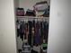 Clothing closet with shelving and hanging clothes at 2409 Maroney Ave, Las Vegas, NV 89104