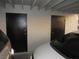 Garage featuring two black doors at 2409 Maroney Ave, Las Vegas, NV 89104